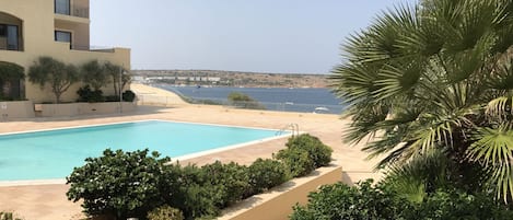 From our balcony to the residence pool and Mellieha Bay