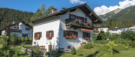 a lovely garden surrounds the cottage