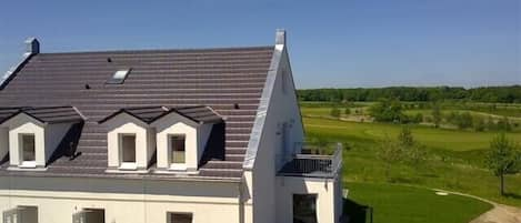 Haus mit Blick über den Golfplatz bis zum Fleesensee