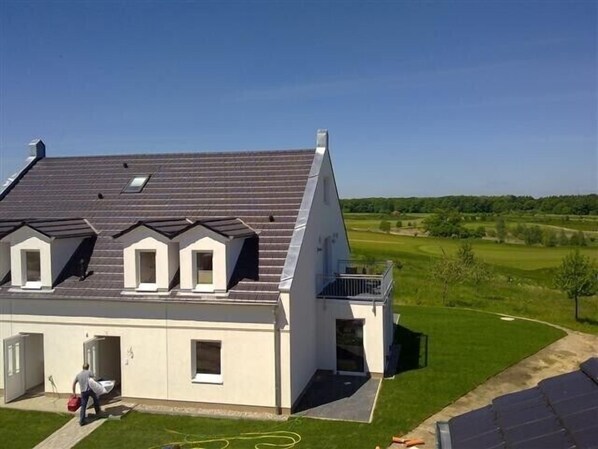 Haus mit Blick über den Golfplatz bis zum Fleesensee