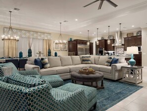 This spacious home is highlighted by designer decor and inviting furnishings