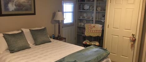 room with view of back door to patio, yard and back entrance
