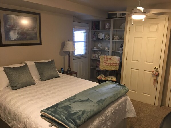 room with view of back door to patio, yard and back entrance 