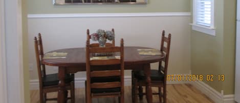 Dining area is in the kitchen. The kitchen is located downstairs.