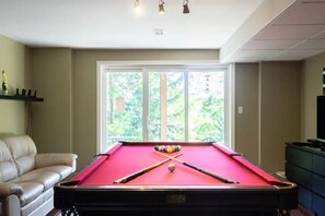 Pool Table in Walkout Basement with Views of Twelve Mile Creek and the Ravine