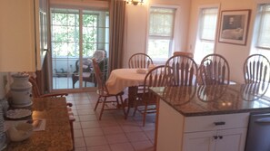 Open concept living, dining and kitchen has vaulted ceilings, quality and more.
