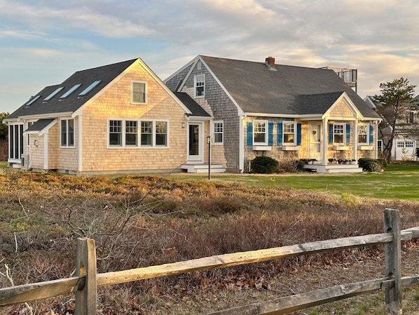 Front of house. Newly planted grass.