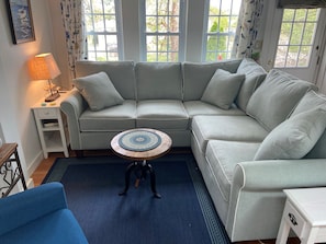 NEW FURNITURE, TWO END TABLE WITH CHARGING STATIONS.