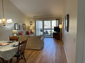 New wood floor throughout the unit.