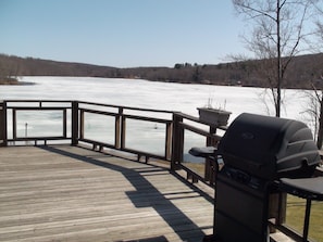 Upper deck with gas grill, winter scene