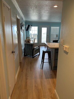 Walking in the front door.