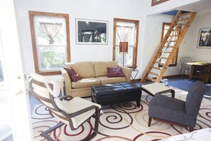 The Studio has a spacious downstairs with high ceilings and a light airy feel.