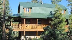 Wow, a huge wrap-around covered deck, big yard area, & fire pit for your s'mores