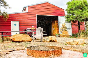 Barndominium with roll up garage door.