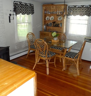 Dining area with new glass topped table seats 4