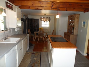 Kitchen and dining area with center island