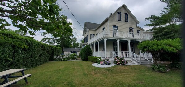 View from Southwest of Front and side of house
