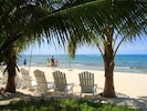Private, shaded beach chair seating for Villa Dos Guests.  Wiggle toes in sand..