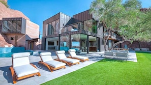 Luxury loungers by the pool for sunbathing w/ immaculate views