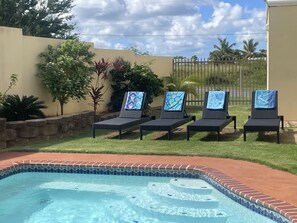 Pool Area with Lounge Chairs