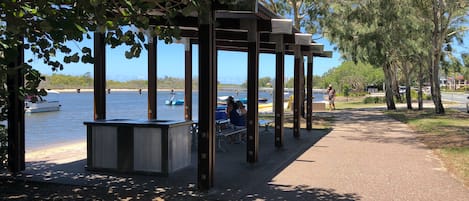 Beautiful shady BBQ and picnic areas along the rivers edge