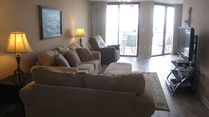 Spacious living area with plenty of comfortable seating including a recliner !!