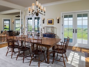 Dining Room and  Family Room with French doors to the veranda overlooking the ocean