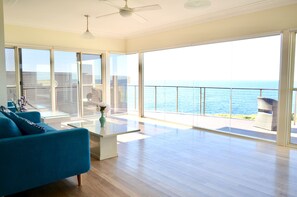 Main upstairs living. Too chilly or sunny out? Continue the views from inside.