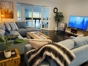 TV lounge area, large screen TV with free NetFlix, YouTube & streaming services