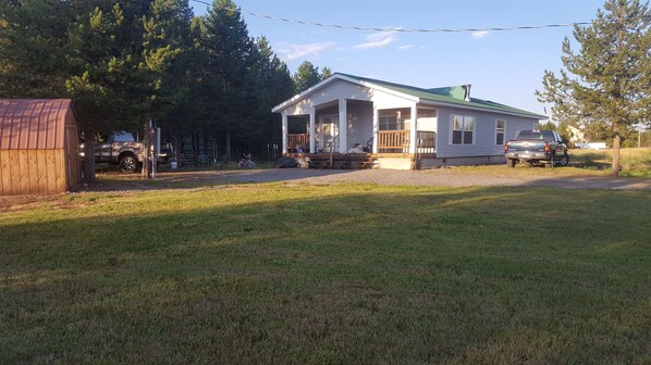 Front view with large kids friendly yard & plenty of room to play outdoors!