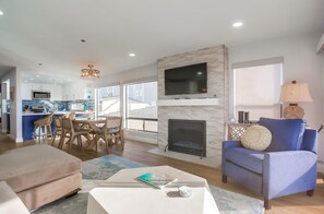 Living space with electric fireplace and Smart TV