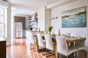 Inviting dining area and kitchen, view on the terrace, A/C unit