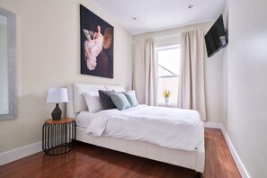 Bedroom #1: queen memory foam mattress, Roku TV, view on the terrace
