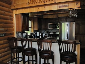 New Breakfast Bar with open floor plan concept to Dining Room