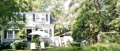 Backyard with private lawn and garden.