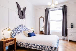 Bright and chic master bedroom with Queen memory foam mattress