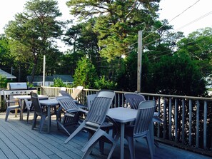 Large deck with seating for 12, gas grill, sand box, parking for 6 cars