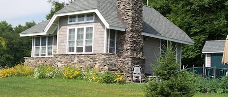 English cottage design built with stones gathered on the property