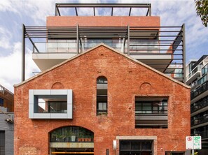 An industrial building converted into contemporary apartments with lots of charm