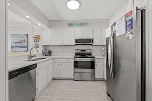 The family chef will love this fabulous kitchen with stainless steel appliances.