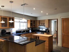 kitchen with granite countertop and stainless appliances