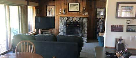 Dining room table seating for 4, with mountainside view