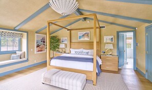Rest easy in the primary bedroom, a dream beachy oasis