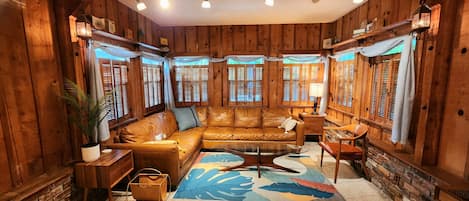 Warm, spacious floor-to-ceiling cedar family room with crisp mid-century touches