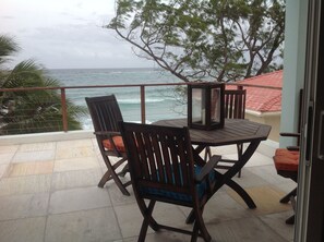 Spacious terrasse with 2 beach beds, BBQ and table with chairs