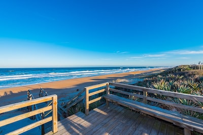 Condo association deck and stairway to nearly private beach!!