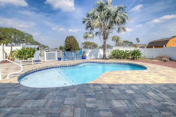 Beautiful heated pool with water views. Large first step for kids or sunbathing