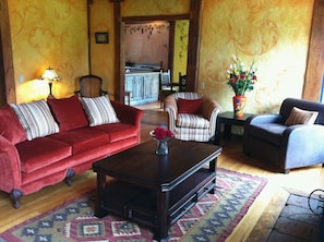 View from living room into open dining room and kitchen 