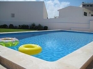 Shared pool with three other villas