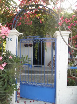 Entrance from the outside. Rental property at the left.